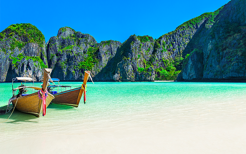 Boats on the shore at Maya Bay